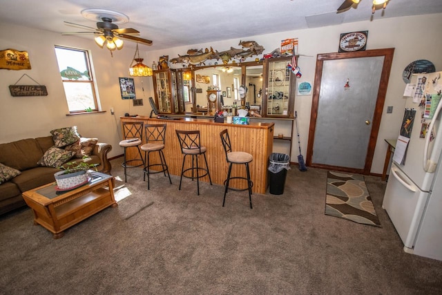 5291 Deer Rd, Hartford, WI 53027 - indoor wet bar featuring freestanding refrigerator, a ceiling fan, and carpet flooring