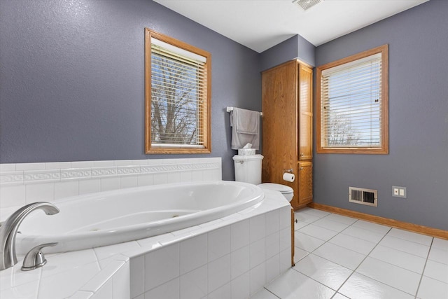 W127S9630 Scott Krause Dr, Muskego, WI 53150 - full bathroom featuring a garden tub, tile patterned floors, and baseboards