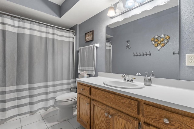 W127S9630 Scott Krause Dr, Muskego, WI 53150 - bathroom featuring tile patterned floors, toilet, a textured wall, and vanity