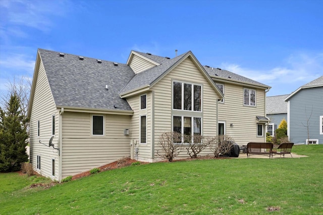 W127S9630 Scott Krause Dr, Muskego, WI 53150 - rear view of property featuring a patio, a yard, and roof with shingles