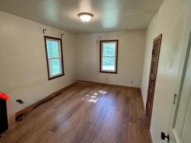 1404 Silver Mine Dr, Eau Claire, WI 54703 - unfurnished room with wood finished floors and baseboards