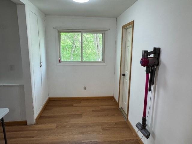1404 Silver Mine Dr, Eau Claire, WI 54703 - corridor featuring wood finished floors and baseboards