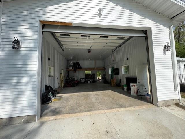 1404 Silver Mine Dr, Eau Claire, WI 54703 - garage featuring concrete driveway