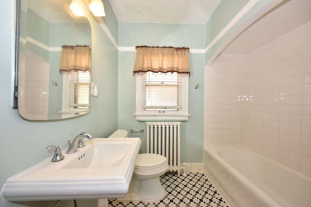 3434 N 45th St, Milwaukee, WI 53216 - full bath with radiator, toilet, a sink, and plenty of natural light
