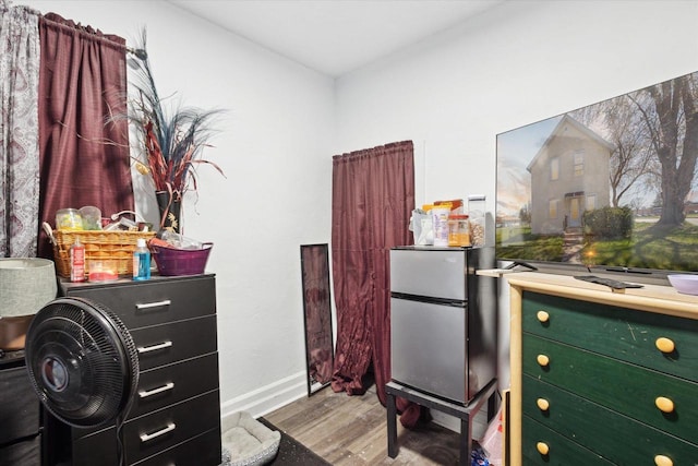 423 Maryhill Dr, Green Bay, WI 54303 - misc room with wood finished floors and baseboards