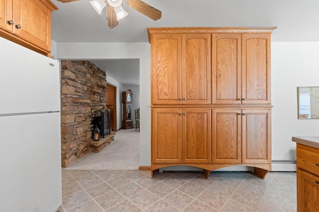 2289 Northwood Rd, Green Bay, WI 54313 - hall with a baseboard heating unit, light colored carpet, and light tile patterned flooring