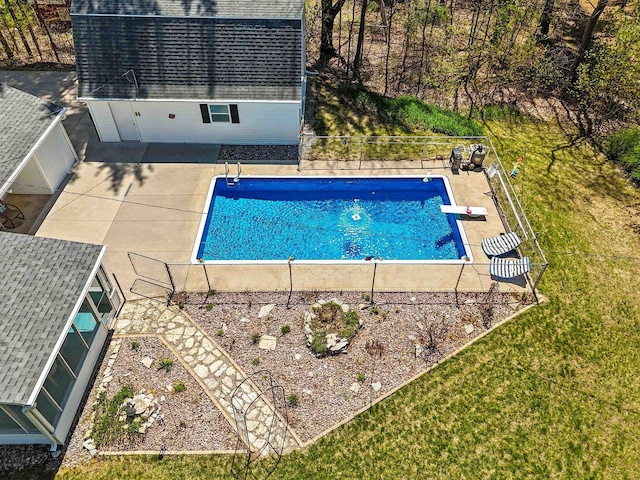 2289 Northwood Rd, Green Bay, WI 54313 - outdoor pool featuring a patio area, a diving board, fence, and central AC