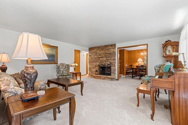 2289 Northwood Rd, Green Bay, WI 54313 - living room with light carpet, a fireplace, and a chandelier