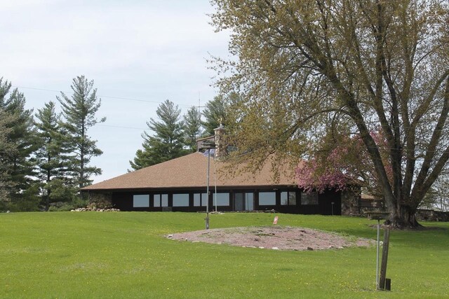 N3177 14th Dr, Montello, WI 53949 - rear view of property with a yard