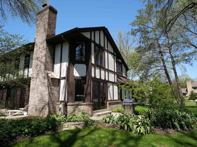 18585 Woodberry Ct, Brookfield, WI 53045 - back of property featuring a chimney