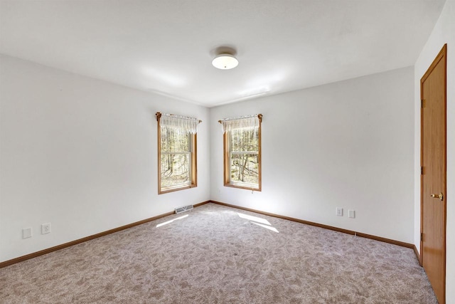 N11598 Helgeson Rd, Iola, WI 54945 - carpeted spare room with baseboards