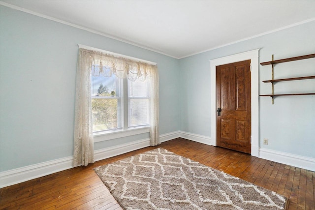 301 S Farmer St, Princeton, WI 54968 - unfurnished room with wood-type flooring, ornamental molding, and baseboards