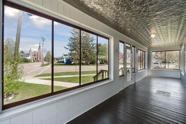 301 S Farmer St, Princeton, WI 54968 - unfurnished sunroom featuring an ornate ceiling, hardwood / wood-style floors, and healthy amount of natural light