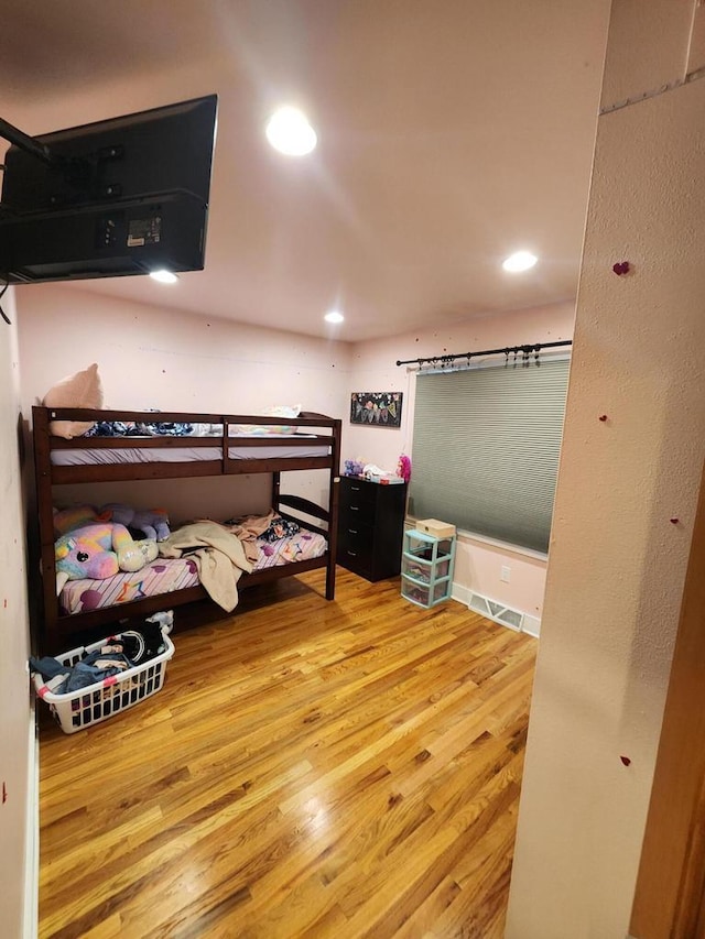 1120 W Blackhawk Dr, Fort Atkinson, WI 53538 - bedroom featuring wood finished floors and recessed lighting