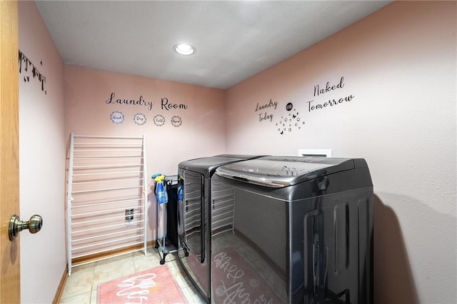 clothes washing area with washing machine and clothes dryer, baseboards, tile patterned floors, and recessed lighting