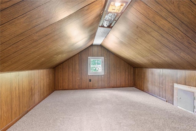 119 E 1st St, Dresser, WI 54009 - bonus room featuring carpet flooring, wooden walls, and lofted ceiling
