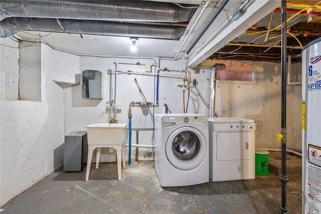 119 E 1st St, Dresser, WI 54009 - washroom featuring washer and dryer and gas water heater