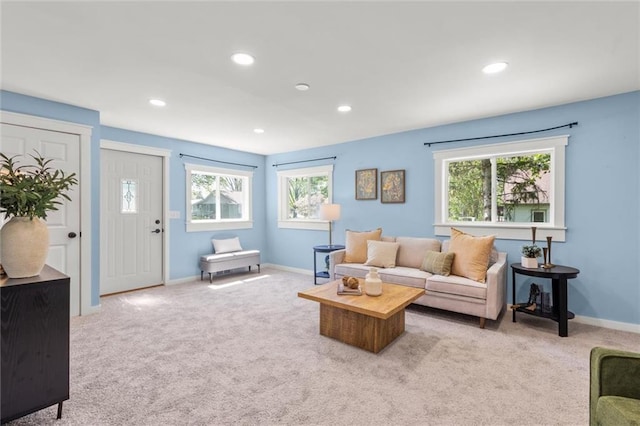 119 E 1st St, Dresser, WI 54009 - living area featuring carpet floors, healthy amount of natural light, baseboards, and recessed lighting