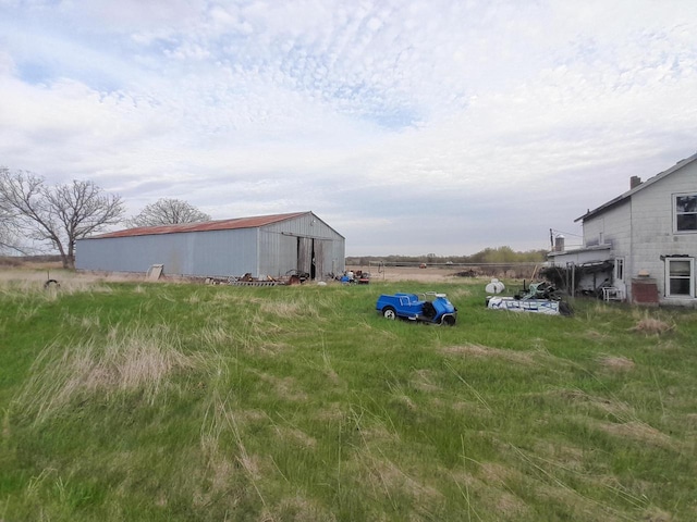 N2184 County Rd E, Redgranite, WI 54970 - view of yard featuring a pole building and an outbuilding