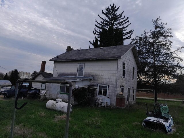 N2184 County Rd E, Redgranite, WI 54970 - back of property featuring roof with shingles