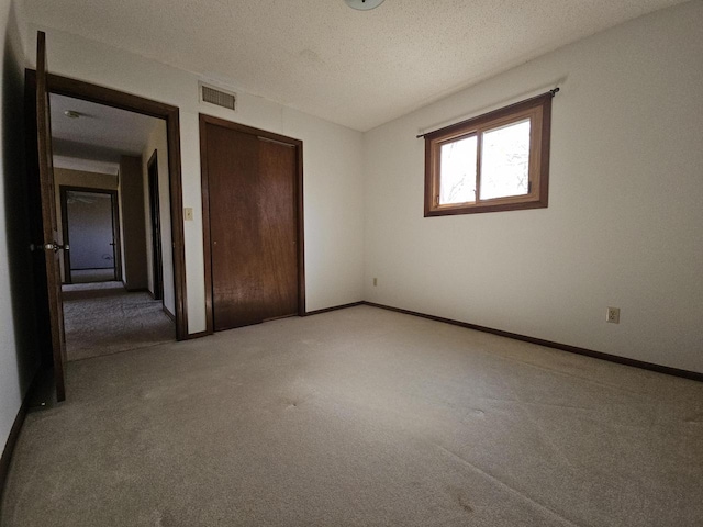 14704 Geneva Rd, Sparta, WI 54656 - unfurnished bedroom featuring carpet floors, a closet, and baseboards