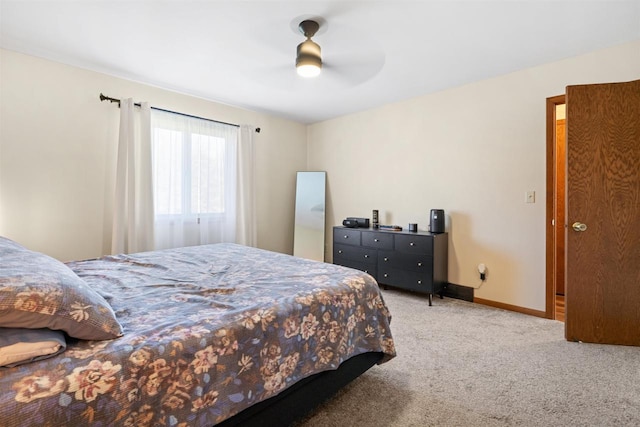 840 Waterworks Rd, Nekoosa, WI 54457 - carpeted bedroom with baseboards and a ceiling fan