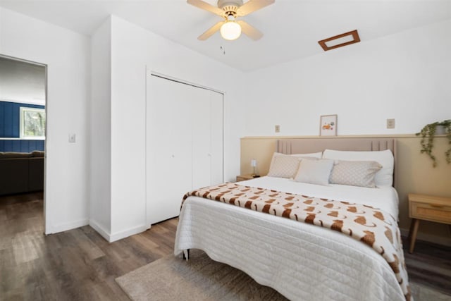 840 Waterworks Rd, Nekoosa, WI 54457 - bedroom with wood finished floors, a closet, a ceiling fan, and baseboards