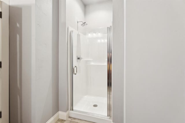 900 Woodcrest Heights Dr, Menasha, WI 54952 - full bath featuring a shower stall and baseboards