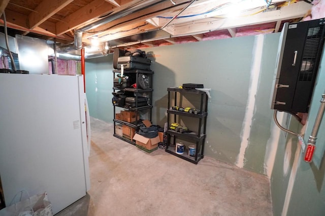 16845 Hawk Rd, Sparta, WI 54656 - unfinished below grade area featuring freestanding refrigerator and electric panel