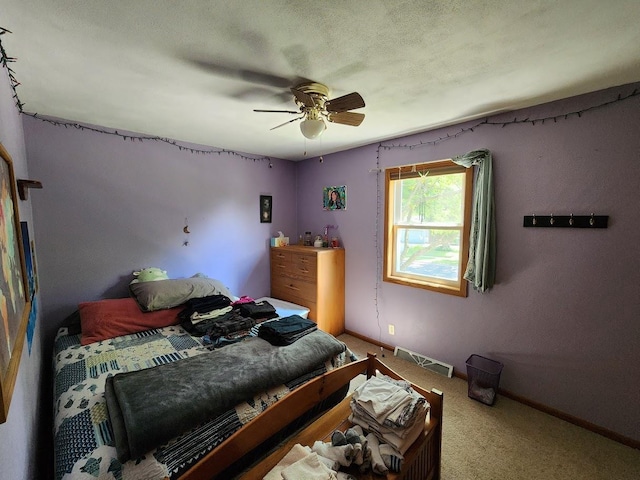 7122 Mockingbird Ln, Middleton, WI 53562 - carpeted bedroom featuring ceiling fan and baseboards