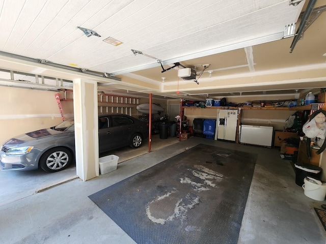 7122 Mockingbird Ln, Middleton, WI 53562 - garage featuring a garage door opener