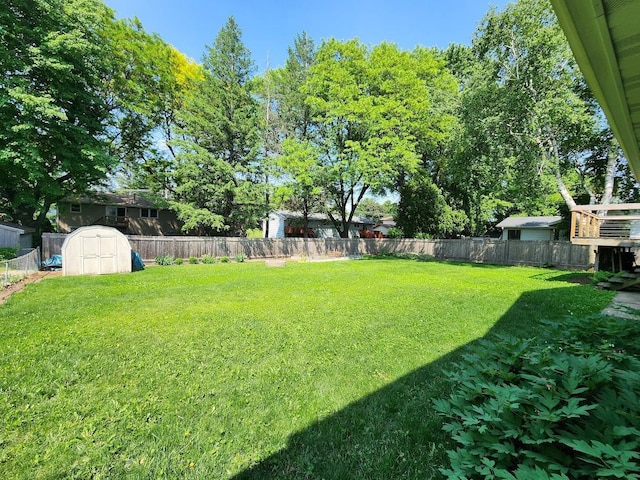 7122 Mockingbird Ln, Middleton, WI 53562 - fenced backyard featuring a storage unit