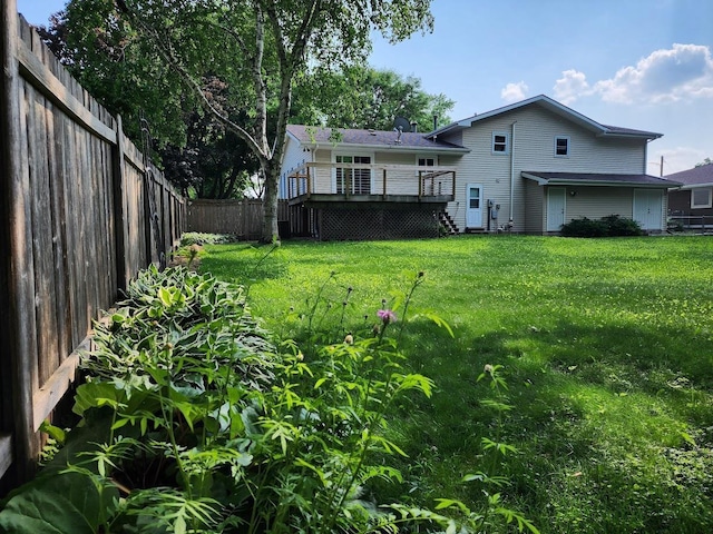 7122 Mockingbird Ln, Middleton, WI 53562 - rear view of house featuring a wooden deck, a fenced backyard, and stairway
