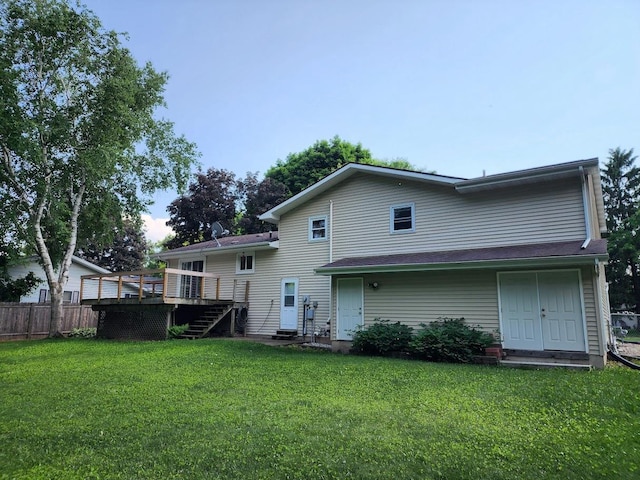 7122 Mockingbird Ln, Middleton, WI 53562 - back of house with a wooden deck and stairway