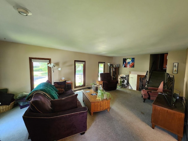 7122 Mockingbird Ln, Middleton, WI 53562 - living area with carpet flooring, plenty of natural light, and stairs