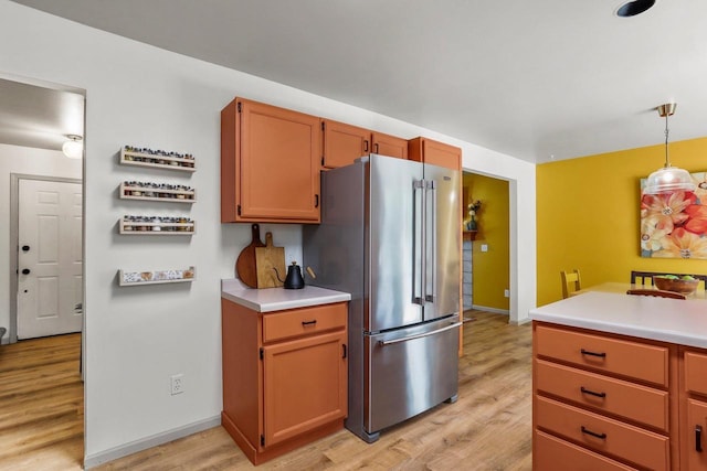 26 Prentice Pl, Madison, WI 53704 - kitchen featuring high end refrigerator, light wood-type flooring, and light countertops