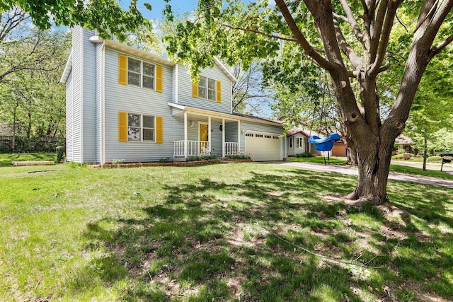 26 Prentice Pl, Madison, WI 53704 - traditional-style house with an attached garage, a chimney, a front yard, and covered porch