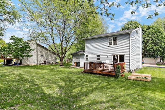 26 Prentice Pl, Madison, WI 53704 - back of property with a wooden deck and a lawn