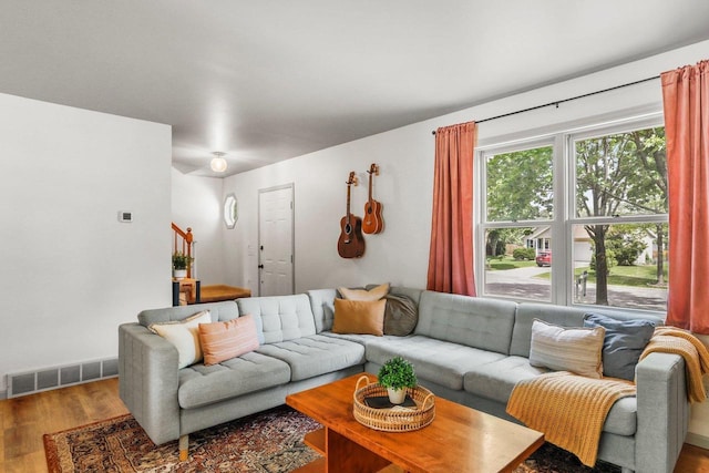 26 Prentice Pl, Madison, WI 53704 - living area featuring wood finished floors, stairs, and baseboards