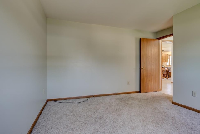 S315 Bluff St, Stephenson, MI 49887 - spare room featuring carpet and baseboards