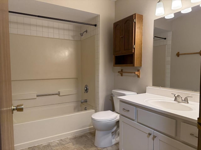 bathroom with shower / bath combination, toilet, and vanity