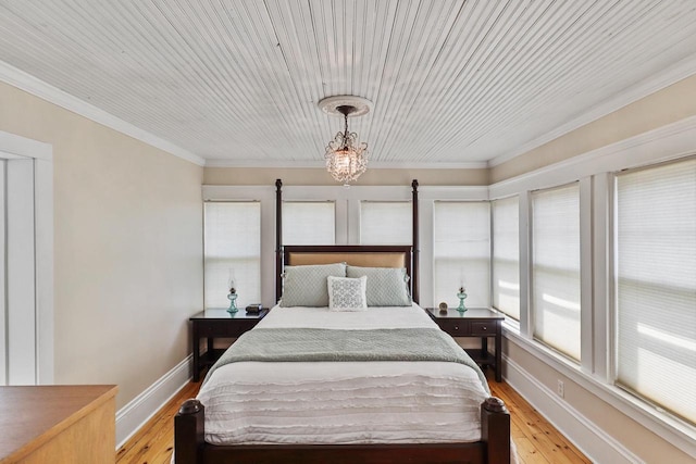 350 Madison St, Wisconsin Rapids, WI 54494 - bedroom featuring light wood-style floors, ornamental molding, and baseboards