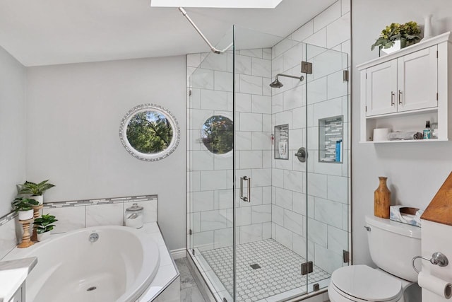 350 Madison St, Wisconsin Rapids, WI 54494 - bathroom with a stall shower, a bath, toilet, and marble look tiles