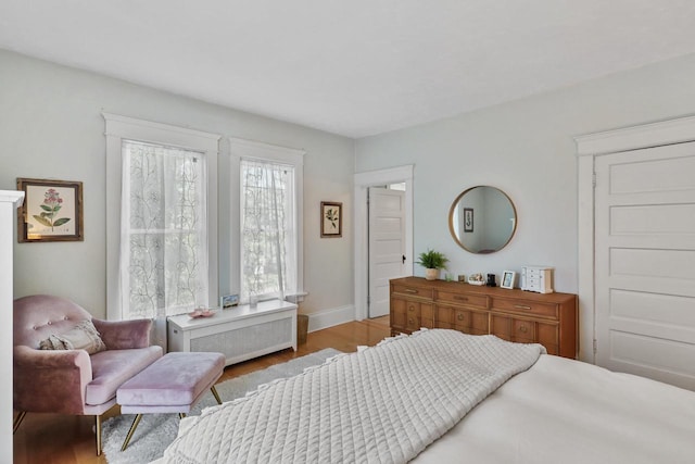 350 Madison St, Wisconsin Rapids, WI 54494 - bedroom featuring light wood-type flooring and baseboards