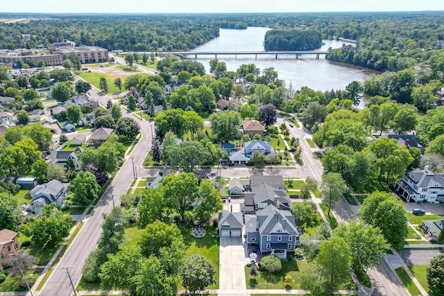350 Madison St, Wisconsin Rapids, WI 54494 - aerial view of residential area featuring a nearby body of water, a notable bridge, and a heavily wooded area