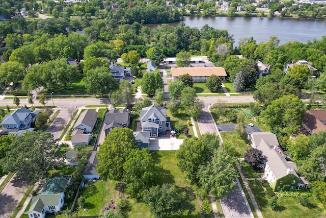 350 Madison St, Wisconsin Rapids, WI 54494 - aerial view of property's location featuring nearby suburban area, a nearby body of water, and a tree filled landscape