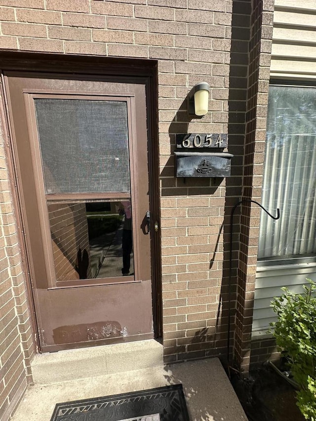 6054 W Port Ave, Milwaukee, WI 53223 - property entrance featuring brick siding