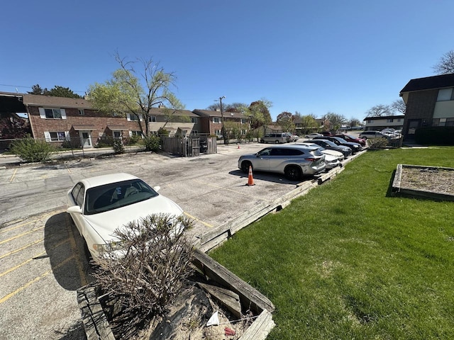 6054 W Port Ave, Milwaukee, WI 53223 - uncovered parking lot with a residential view