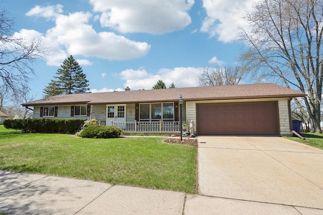 1445 17th Ave, Grafton, WI 53024 - ranch-style home with an attached garage, concrete driveway, a front yard, and a chimney