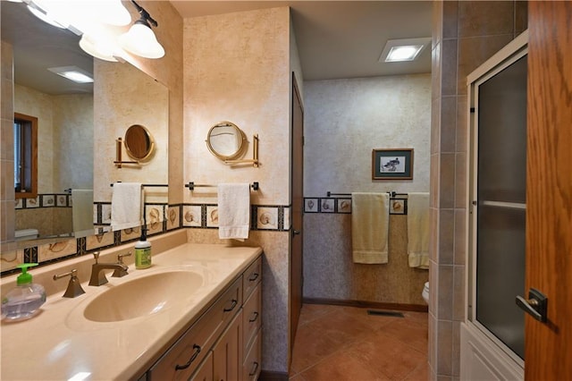 23075 Missionary Point Dr, Cable, WI 54821 - full bath with tile patterned flooring, an enclosed shower, toilet, and vanity